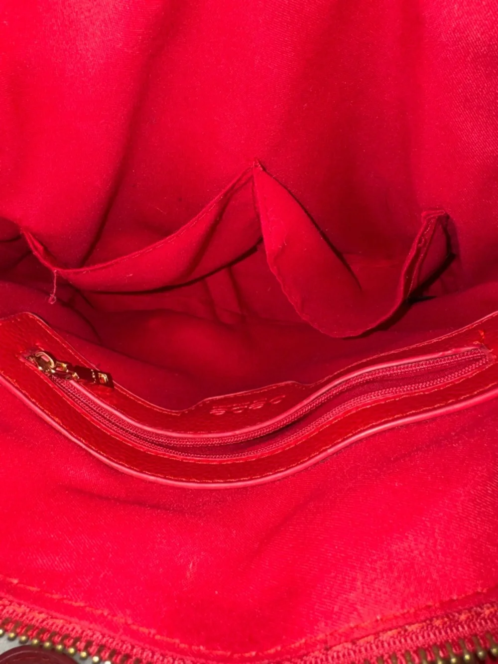 bebe Red Pebbled Fabiola Leather Satchel with Gold Logo Accent with strap.
